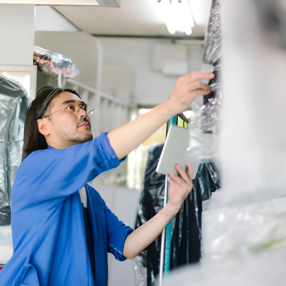 Laundry inspection by professional laundry attendant